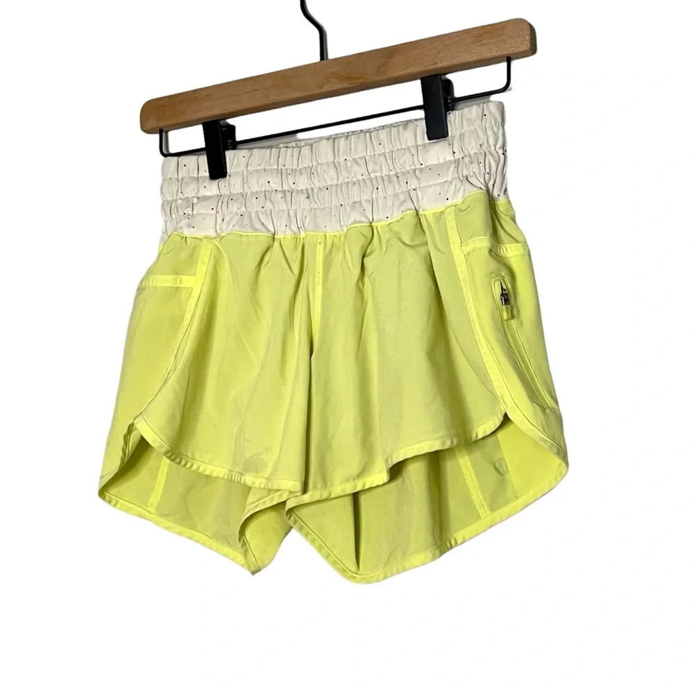 Lululemon Tracker Yellow Shorts with Multicolored Dot patterned waistband